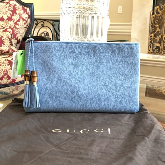 Gucci Handbags - Authentic Gucci large clutch